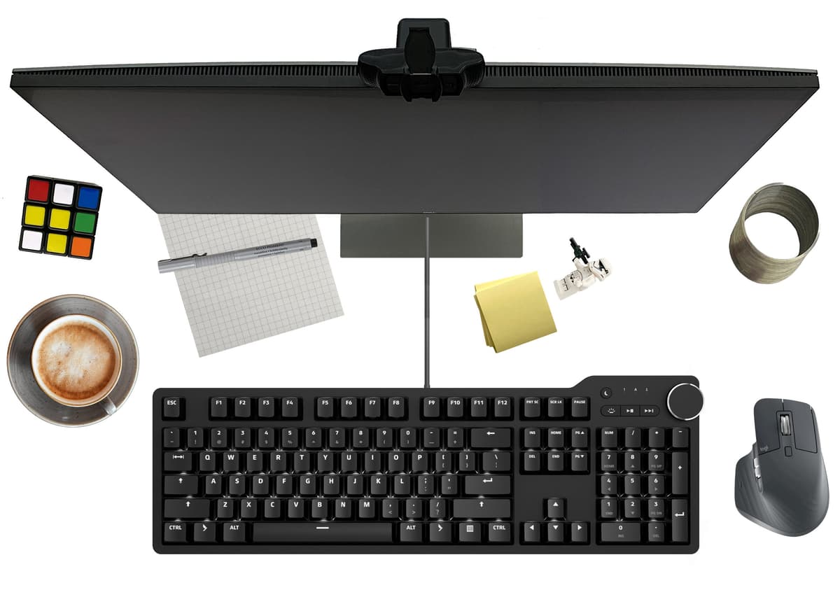 Das Keyboard 6 Professional on a developer's desk, next to a terminal